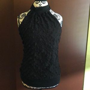 Black ruffled sleeveless top